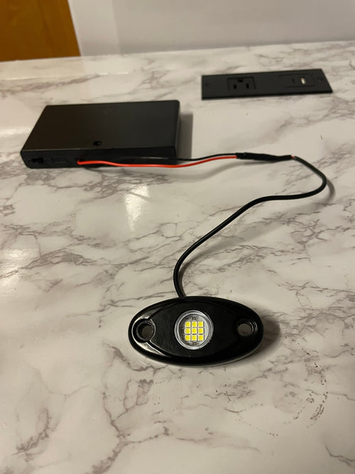 Battery powered rock light pre order