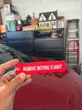 Remove before flight keychain